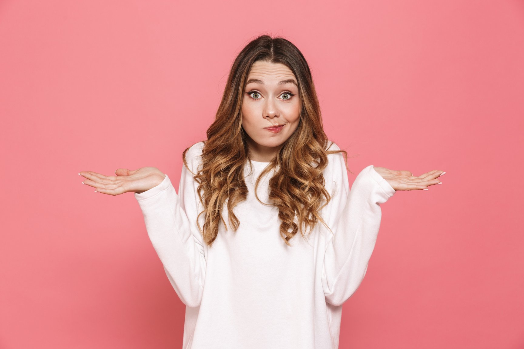 Confused Young Casual Girl Shrugging